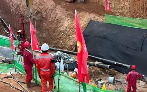 Pipeline relocation project site for Shantou-Meizhou Highway expansion, showing the coexistence of the existing pipeline and highway construction.