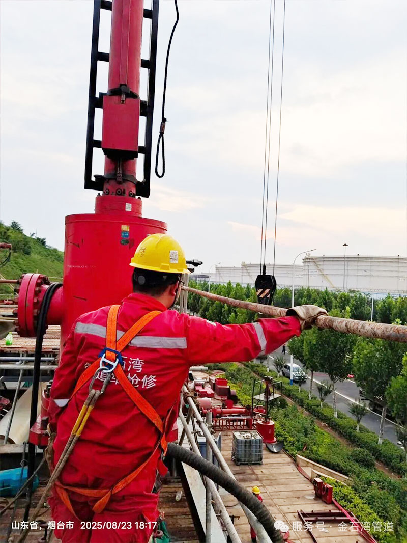 Executing onshore crude oil pipeline hot tapping and plugging to safely isolate a section for repair without stopping flow.