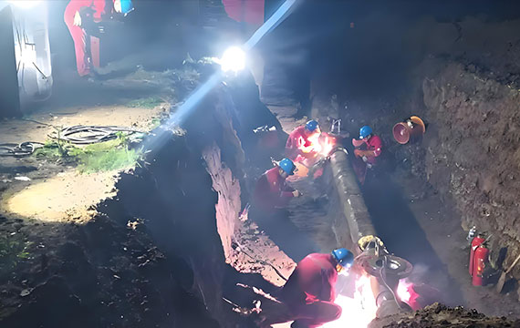 Round-the-clock response: our 24/7 pipeline emergency repair services in action, mobilizing equipment and personnel through the night to reach the site.