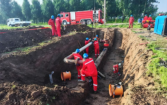 Performing a critical hot tap on the live DN200 pipeline - a key step in our pipeline emergency repair services to install isolation valves without shutdown.