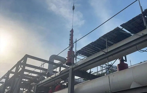 Professional hot tapping services for large diameter pipelines, performing a precise cut on a live crude oil line without production shutdown.