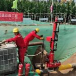 Jinshiwan engineers conducting a pre-construction field survey to verify pipeline material and conditions, a critical first step for project success.