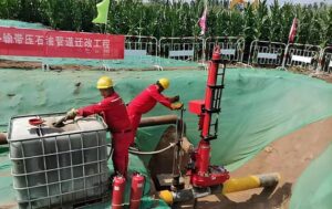 Jinshiwan engineers conducting a pre-construction field survey to verify pipeline material and conditions, a critical first step for project success.