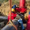Specialized hot tapping equipment operating on live 2.2MPa natural gas pipeline, enabling zero-interruption relocation technology.