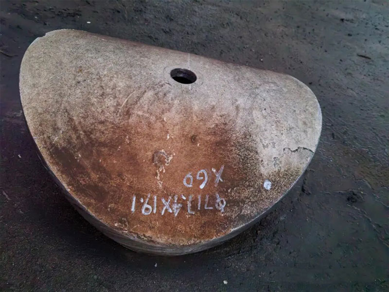 A long-stroke hot tapping machine performing a critical hot tapping service on a high-grade, thick-wall pipeline outfitted with a branch outlet.