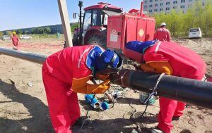 A certified welder executing a high-integrity weld on the 1.6 MPa natural gas pipeline, showcasing our pipeline engineering services expertise.