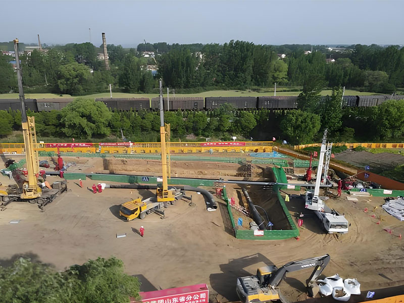 Aerial perspective of construction site for abandoned pipeline disposal and oil pipeline decommissioning