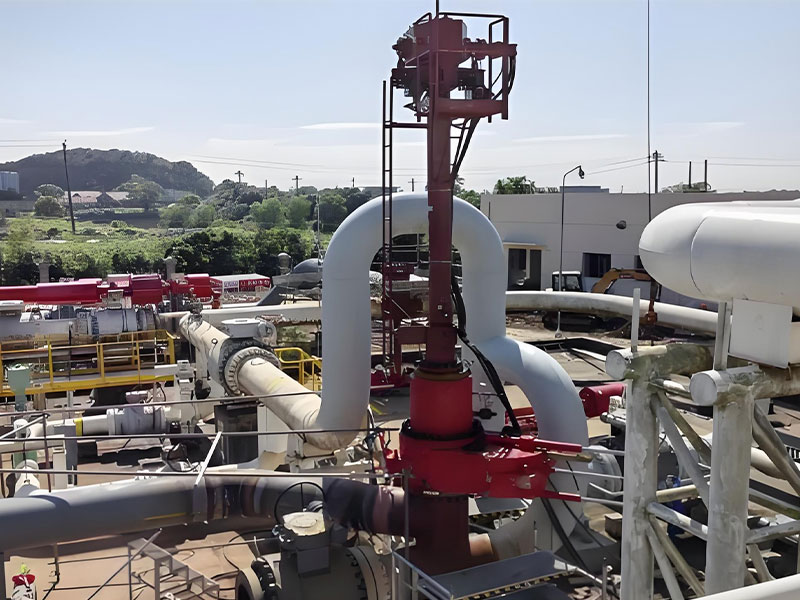 Hot Tapping Device Integrated in Pipeline System of EPC Modification Project Red hot tapping device integrated with industrial pipeline system in EPC pipeline modification project site