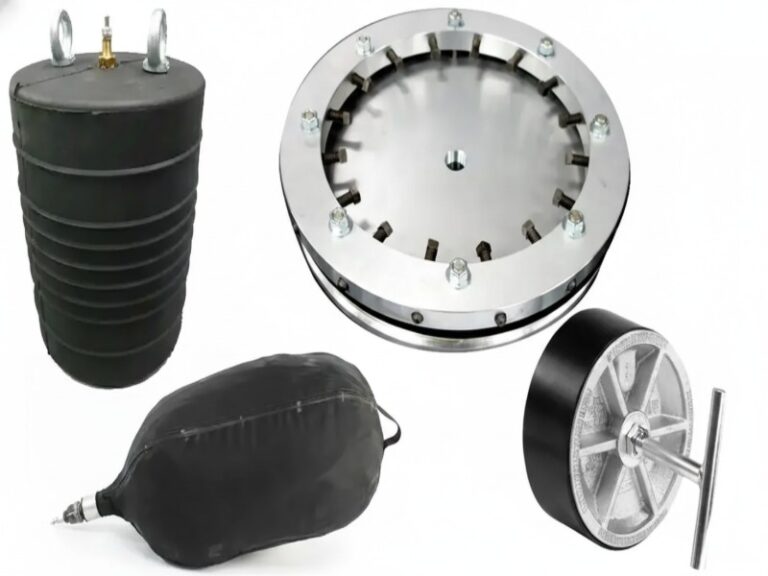A collection of various industrial pipe plugs, including ribbed inflatable rubber plugs, a large circular metal mechanical plug, and a mechanical pipe blocker with a T-handle for plumbing and pipeline testing.